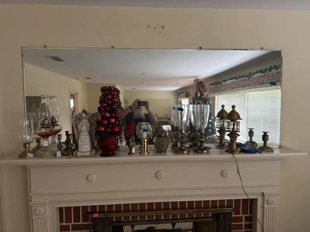 Large mirror above fireplace