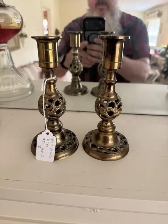 Set up two vintage brass candleholders