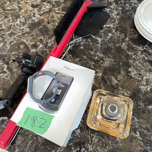watch, verizon flip phone, phone holder, fly swatter, and misc