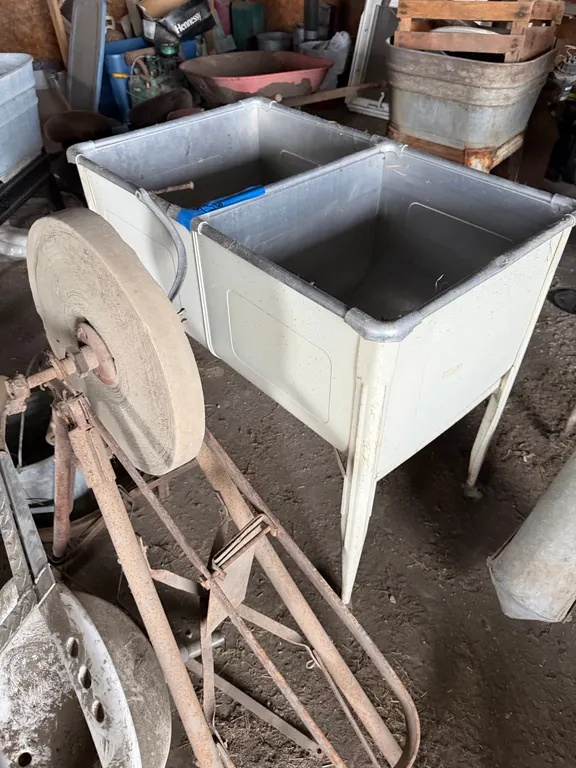 Double wash tub with stand, peddle grinder, other misc.