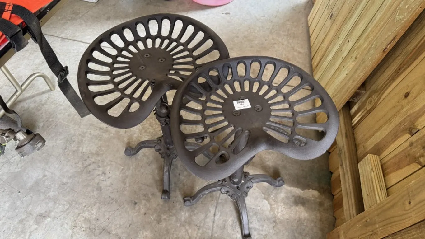 2 Tractor Seat Style, Adjustable Stools, One Has a Broken Footrest