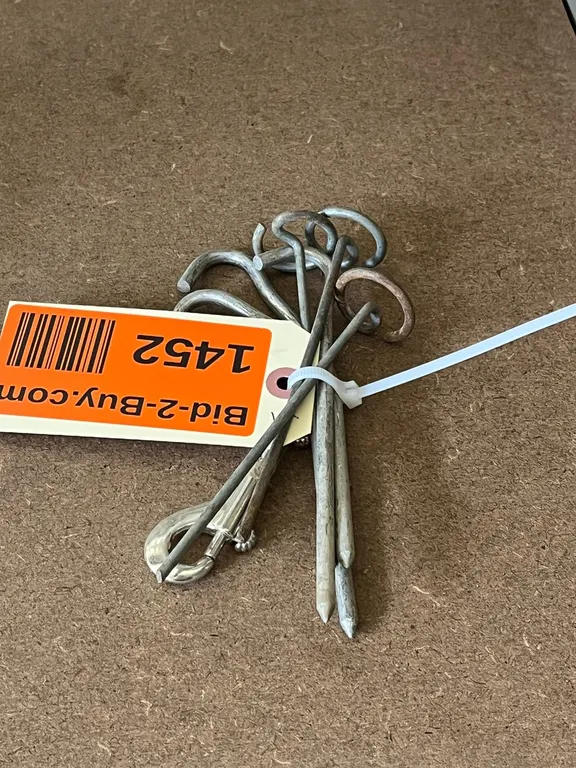 (7) Tent Stakes and Clips
