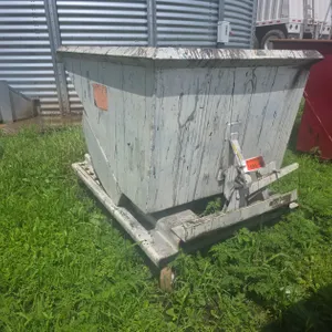 Self dumping hopper on wheels