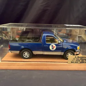 DIECAST MODEL OF FORD F-150 XLT