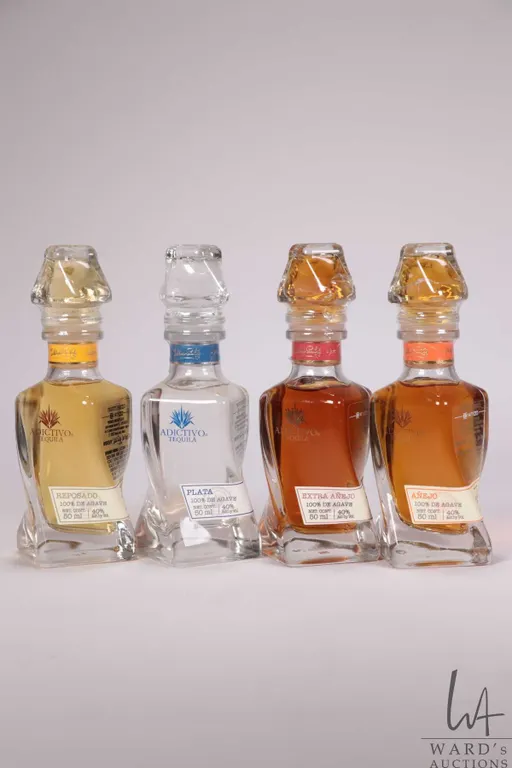 Four bottles of Adictivo/ Tequila/ each 50ml/ each 40% ABV Note: Alcohol cannot be insured by any c