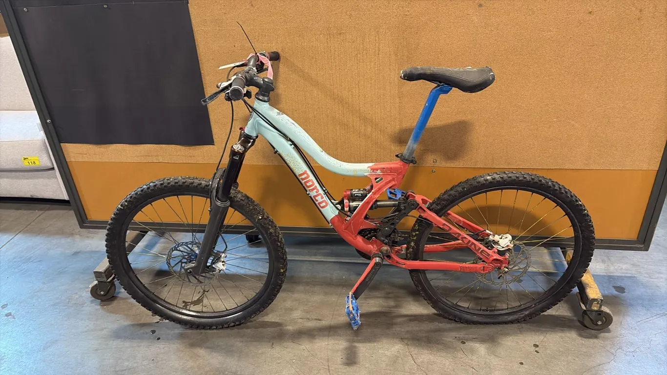 LIGHT BLUE/RED NORCO VIXA 18-SPEED FULL-SUSPENSION MOUNTAIN BIKE