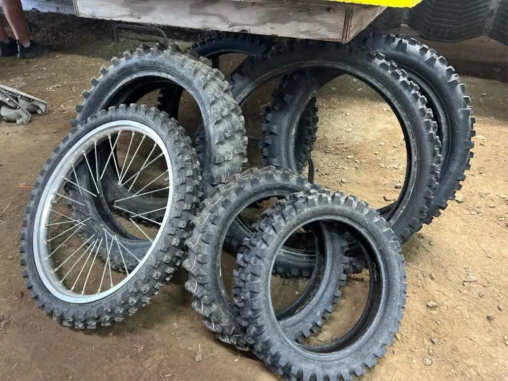 8 assorted dirtbike tires of various size
