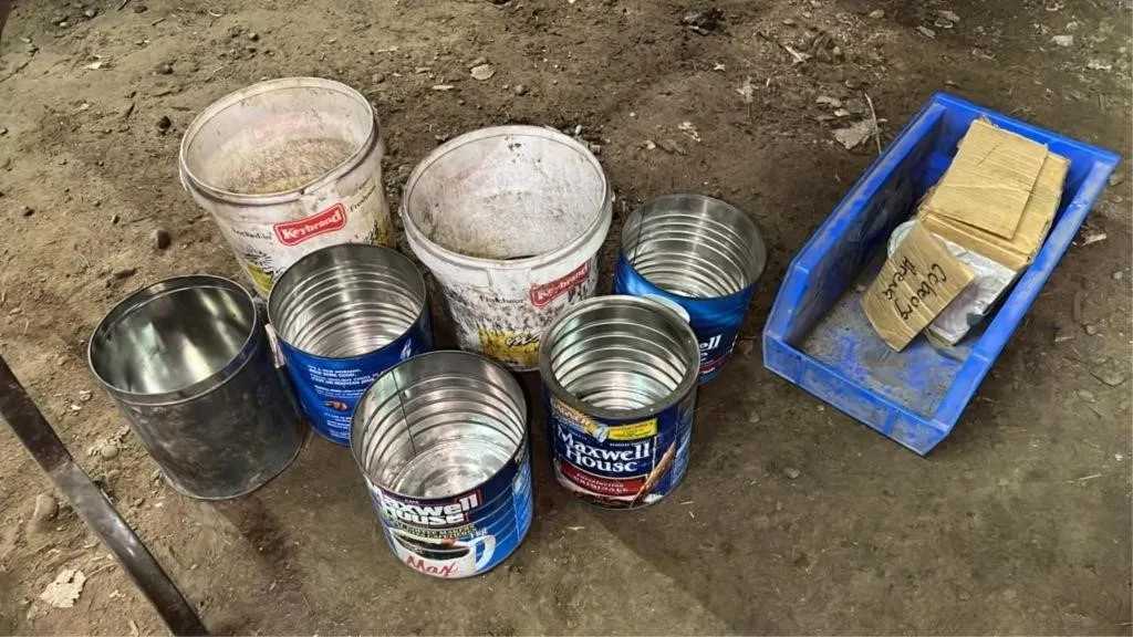 Assorted coffee tins and buckets