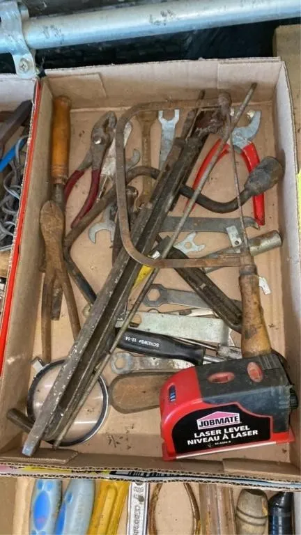 Assorted hand tools and level