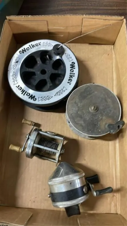 Fishing line, vintage reels and tackle box