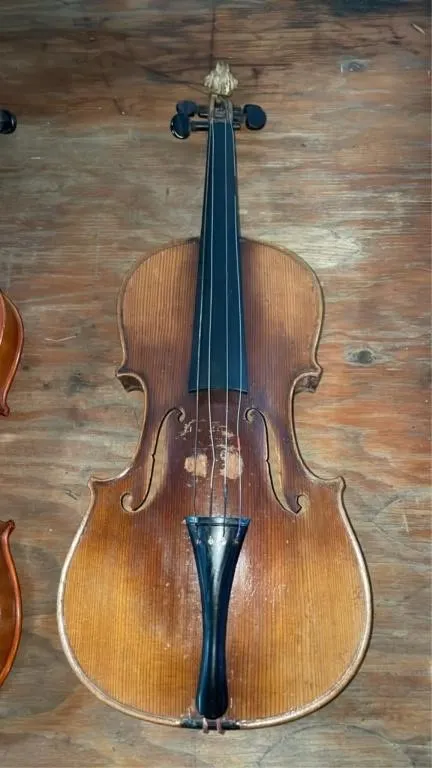 Violin - some strings are bent
