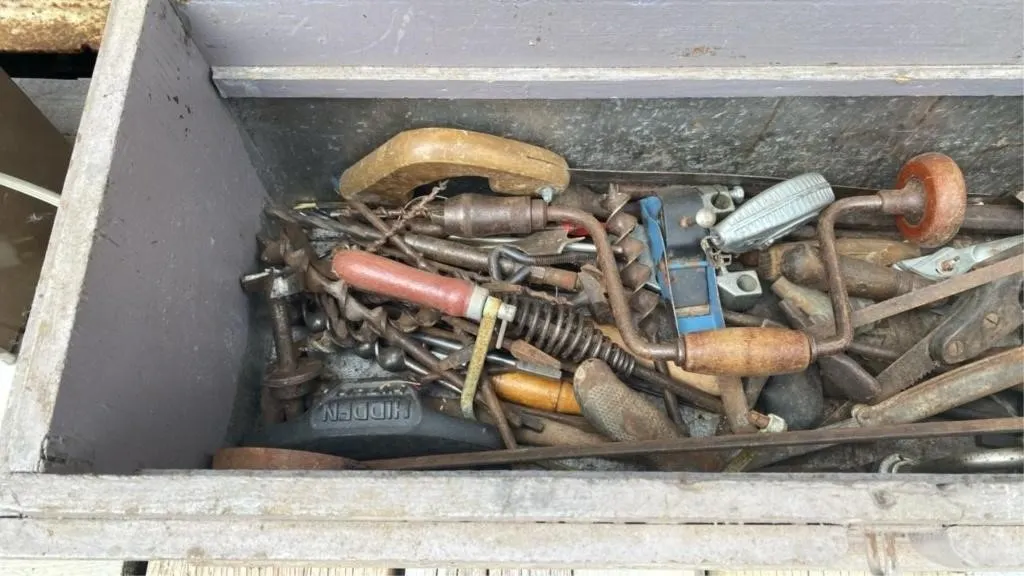 Carpenters toolbox full of tools
