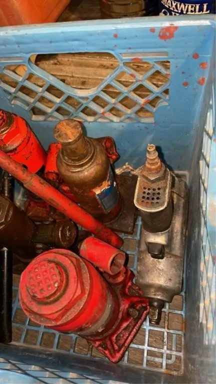 Crate of small hydraulic jacks