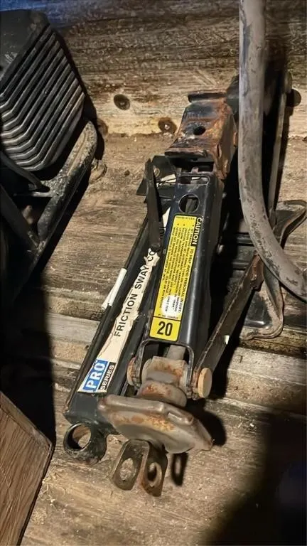 Car jack and friction sway controller