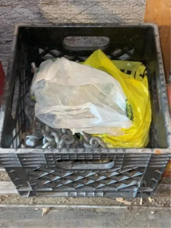 Milk crate with assorted chain links