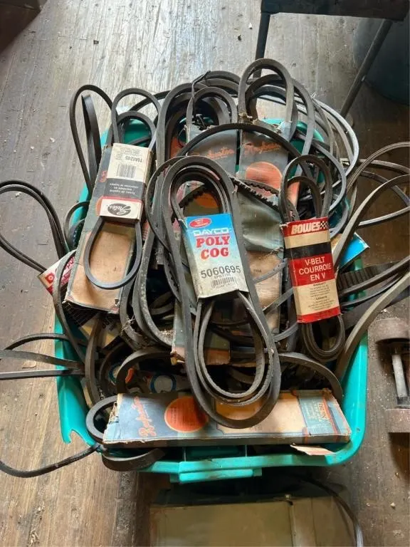 Large bin of assorted belts