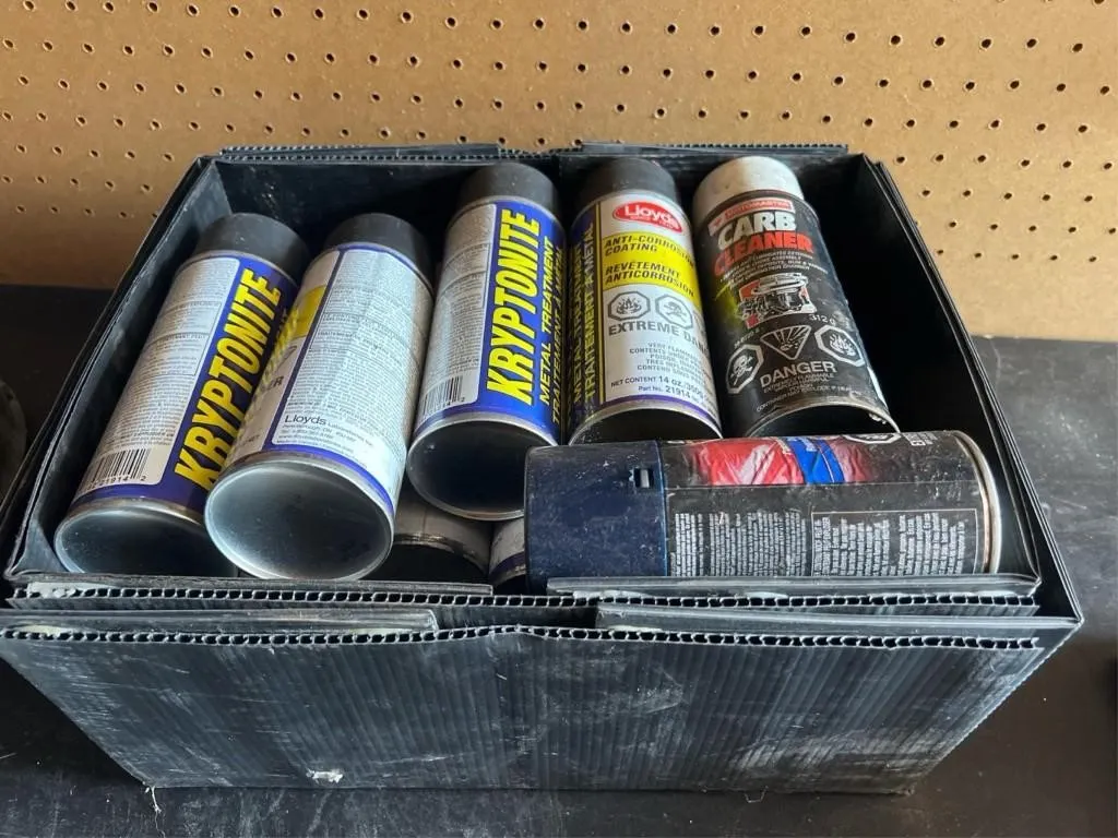 Bin of spray cans and lithium grease