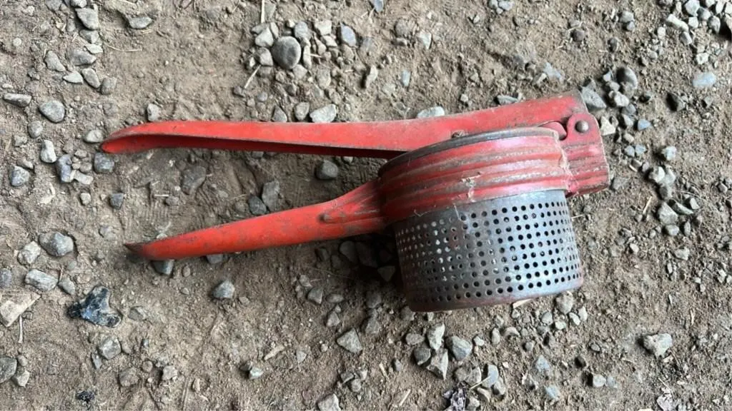 Antique potato ricer