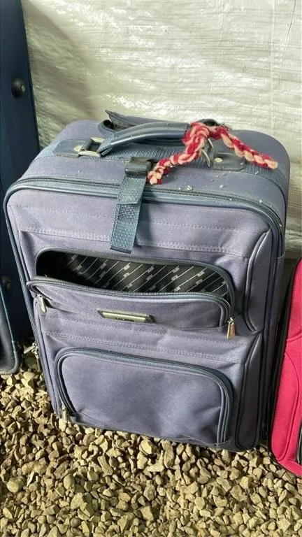 14.5x8x21in tall suitcase