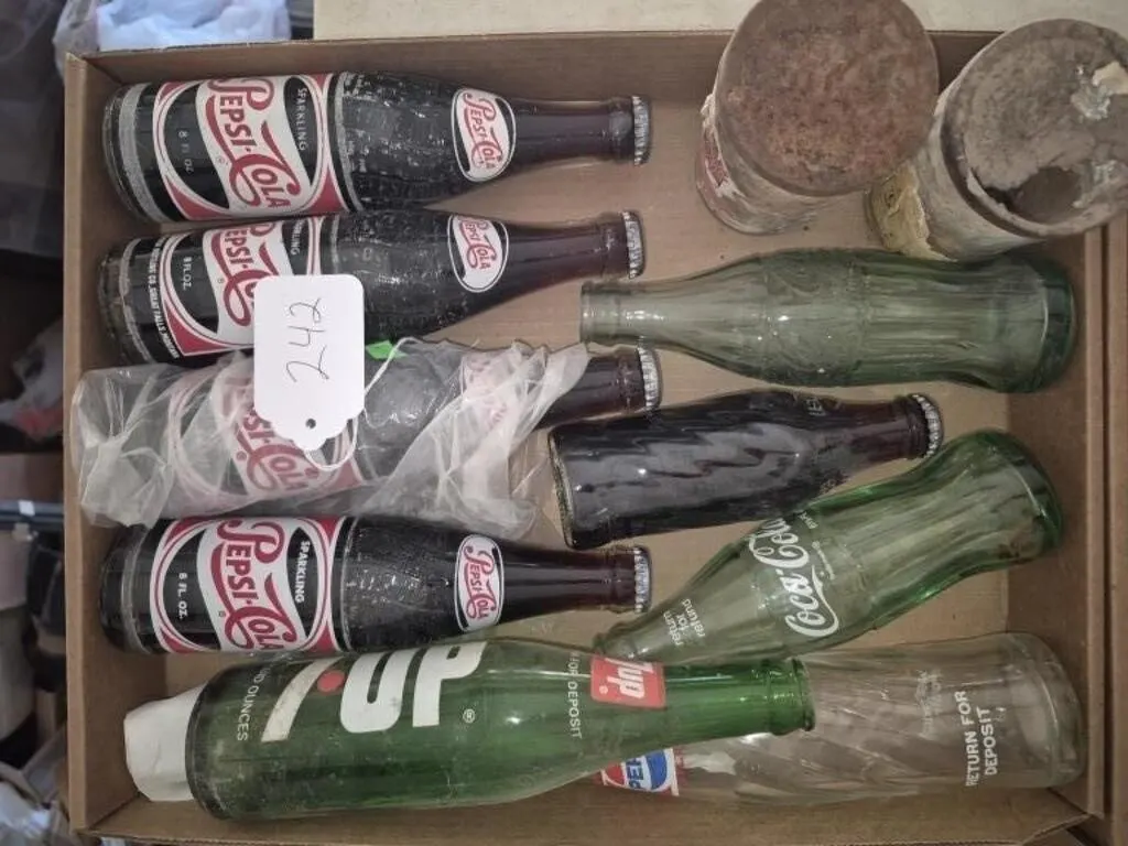 Pepsi Cola and Coca-Cola Bottles