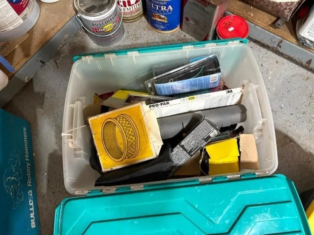 Tote of Misc JD Parts, Sand Paper, Filters etc
