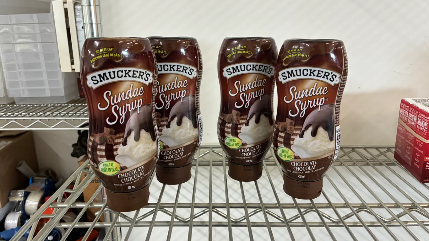 (4) Bottles of Smuckers Sundae Syrup