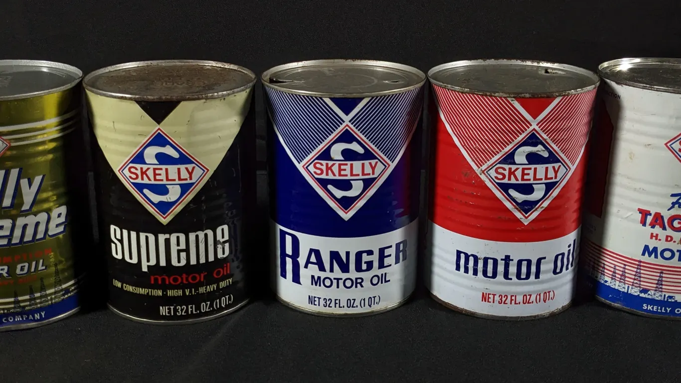 5 METAL SKELLY MOTOR OIL CANS