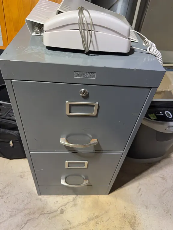 File Cabinet, Binders, Landline Phone