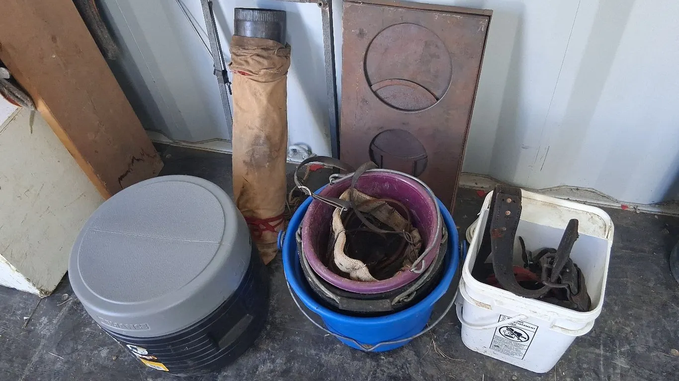 Folding Stove, Stove Pipe, Feed Buckets, Toilet (NC)