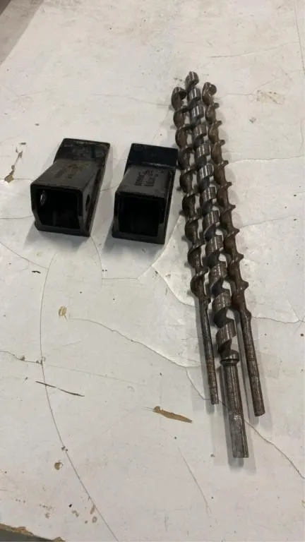 3 heavy duty drill bits and 2 Bobcat bucket tooths