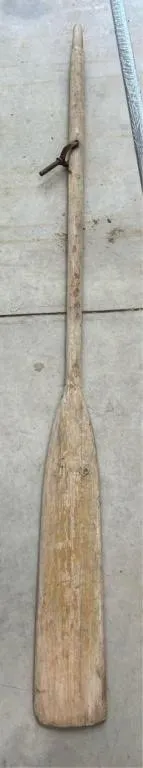 Wooden oar with steel mount pin