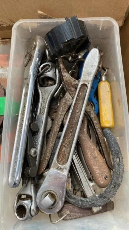 Small bin of assorted tools