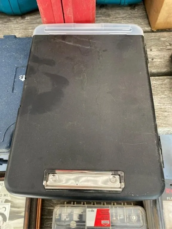 Plastic clipboard with paper storage