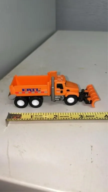 Miniature diecast toy ERTL plow truck