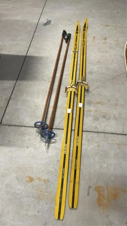 Pair of vintage Nordic skis and poles