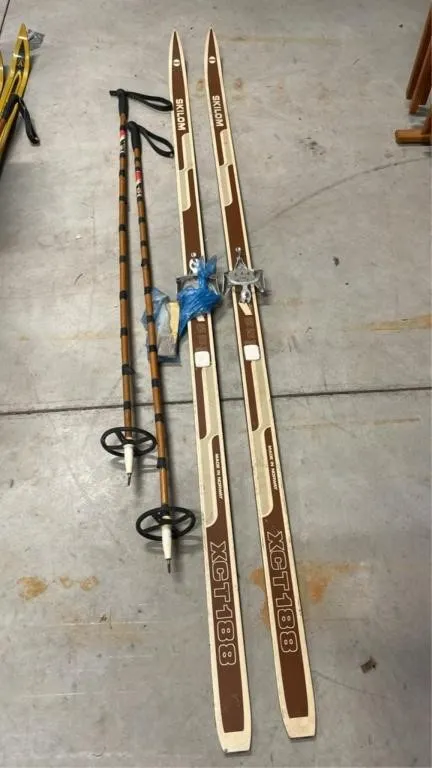 Pair of vintage Nordic skis and poles