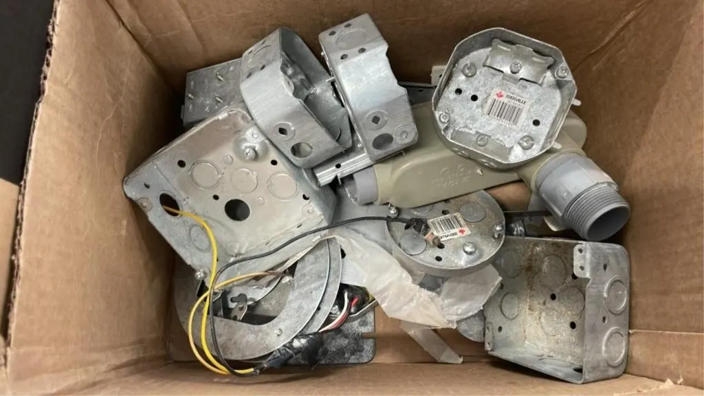Assorted electrical boxes and parts