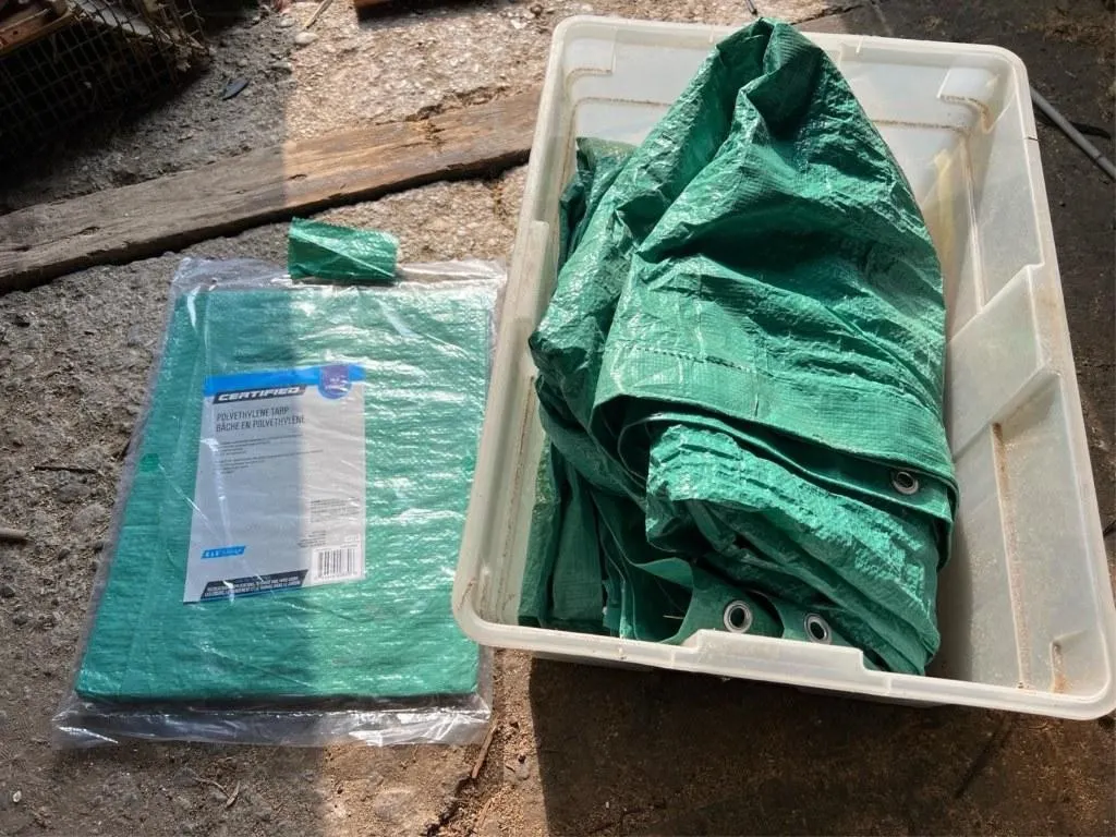 Bin with 2 tarps - 1 unknown & 1 4x6ft