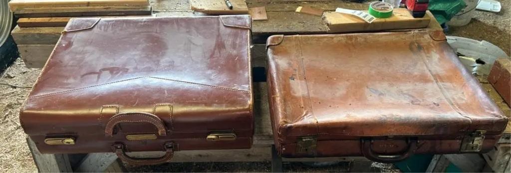 2 vintage brown hard-sided suitcases