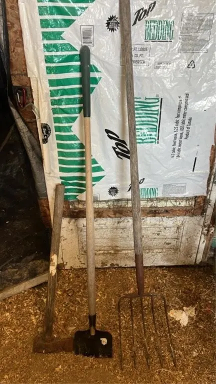 Axe, hay fork, and edger
