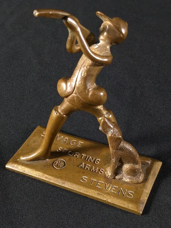 BRASS OR BRONZE ADVERTISING COUNTERTOP SIGN PAPER WEIGHT STEVENS SAVAGE SPORTING ARMS