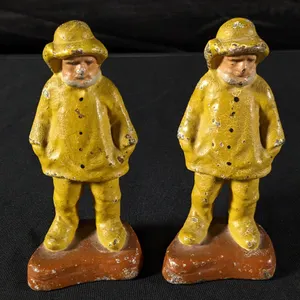 PAIR CAST IRON "OLD SALT" FISHERMAN YELLOW SLICKER BOOK ENDS OR DOOR STOPS