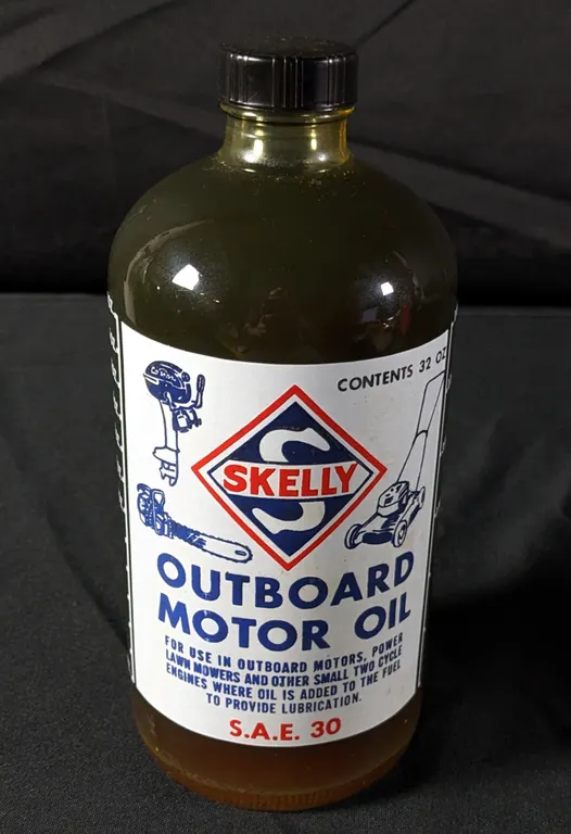 FULL QUART BOTTLE SKELLY OUTBOARD MOTOR OIL