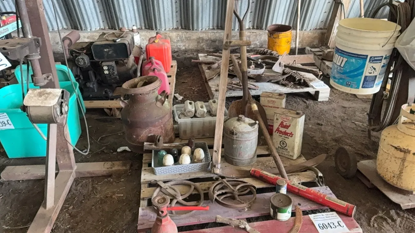 ANTIQUE FIRE EXTINGUISHERS, PAINT CAN, GRAVEL SHOVEL, CNR INSULATORS, CREAM CAN, CAR JACK, WOOD HANDLED SYTHE - DISPERSAL FOR CLARENCE YOUNG - SOLD OF