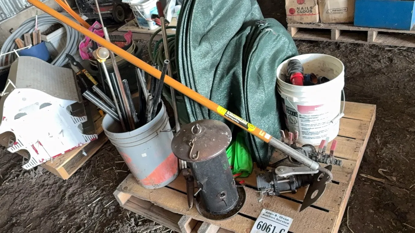 LARGE HOE, 1/2" 100FT GARDEN HOSE, BUCKET OF CAM LOCKS, GRASS SHEARS, BIRD FEEDER, ROOT FEEDER, BUSH COVERS AND PEGS, CAMLOKS FOR IRRIGATION HOSE- CLA