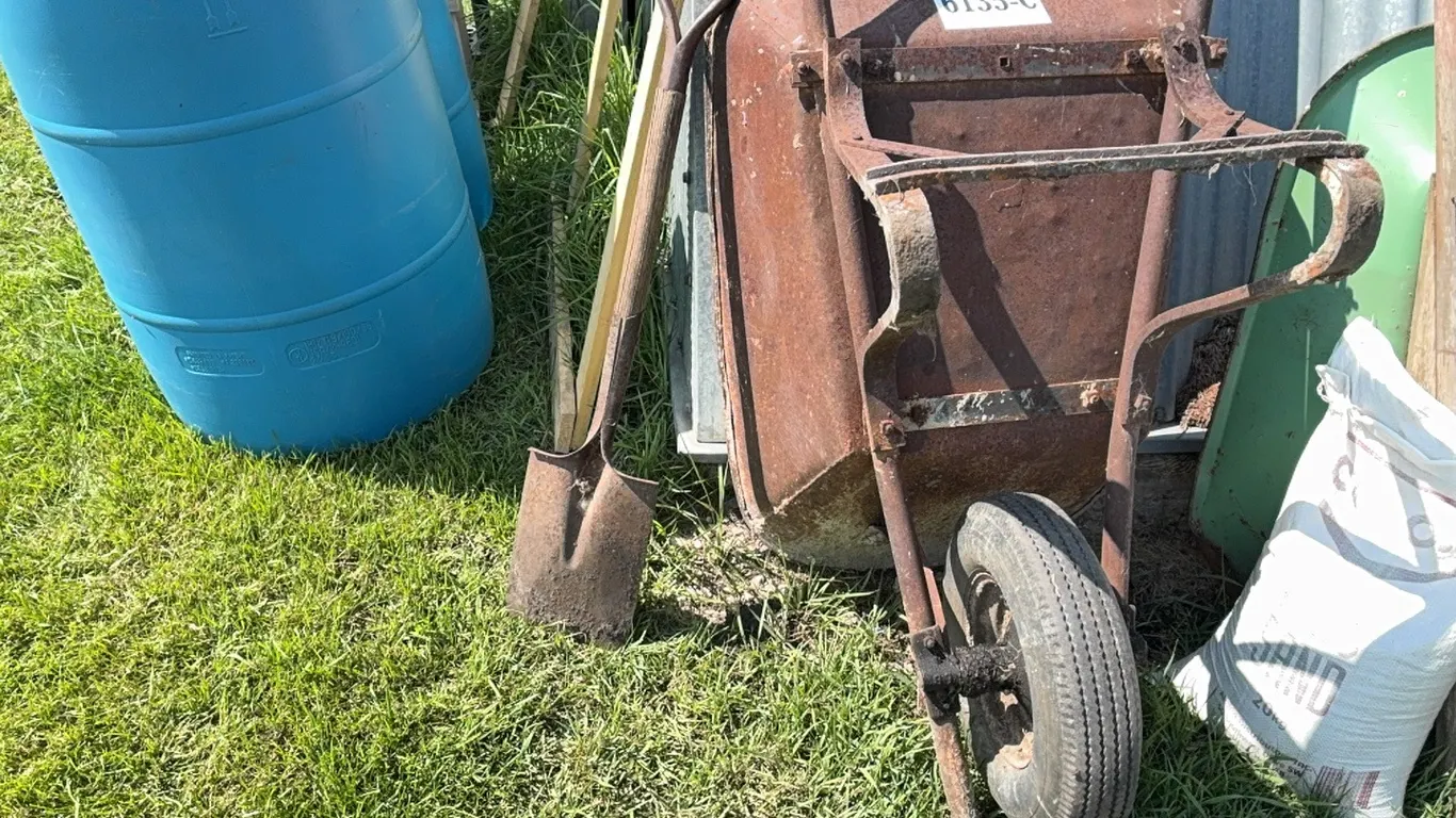 WHEEL BARROW & SHOVEL - DISPERSAL FOR CLARENCE YOUNG - SOLD OFFSITE EDBERG, AB