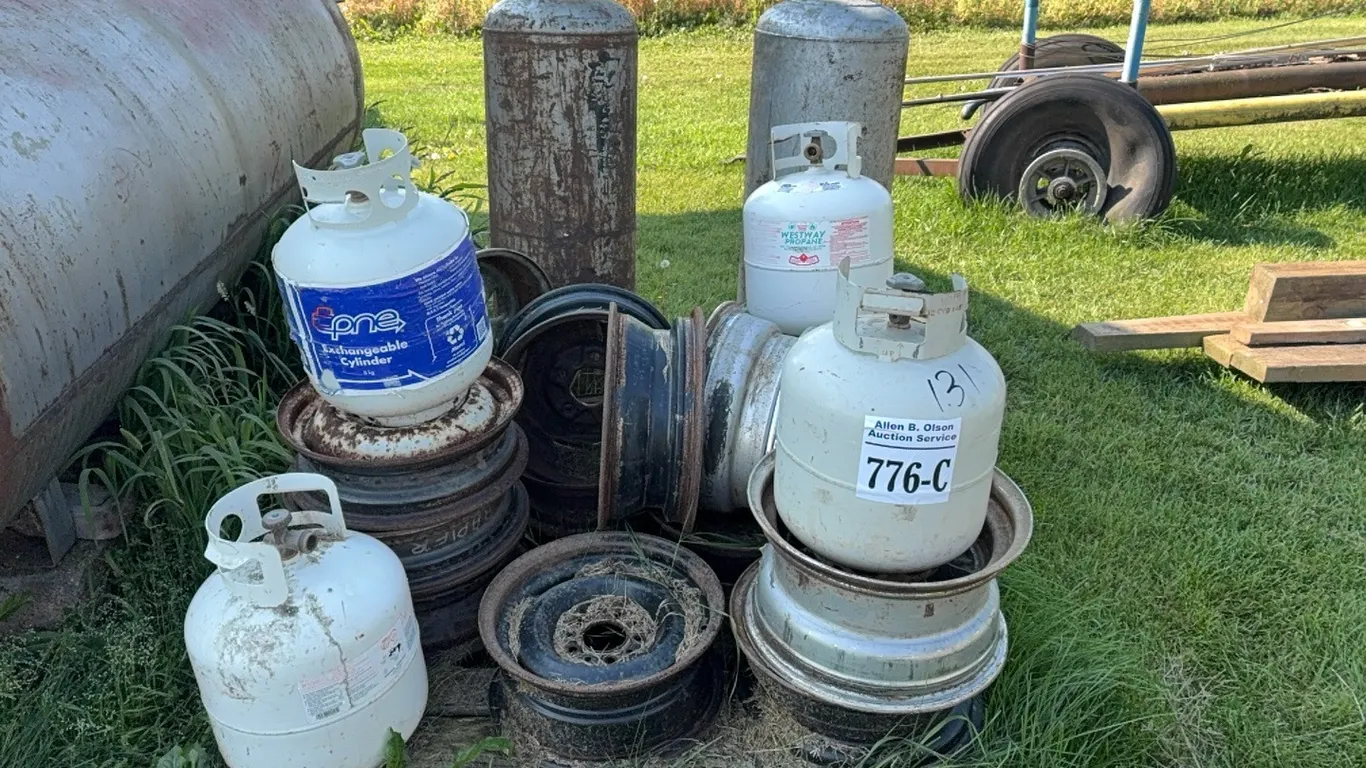 OLD PROPANE TANKS, TIRE RIMS - DISPERSAL FOR CLARENCE YOUNG - SOLD OFFSITE - EDBERG, AB