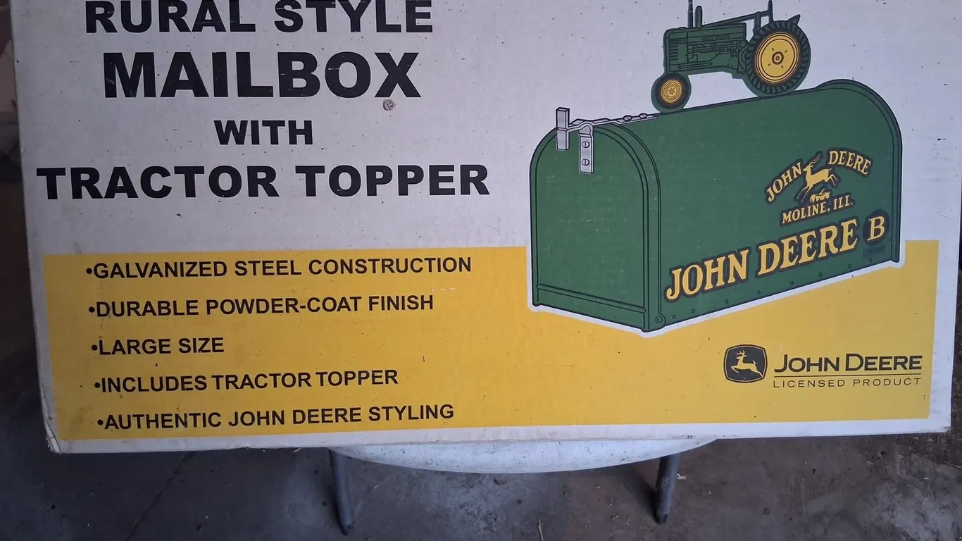 John Deere mailbox. Never installed, new in box.