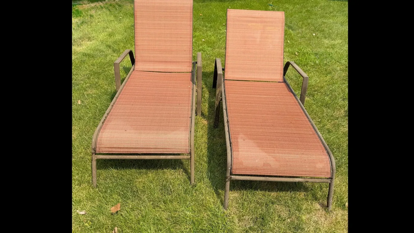 Two 76 inch recliner lawn chairs