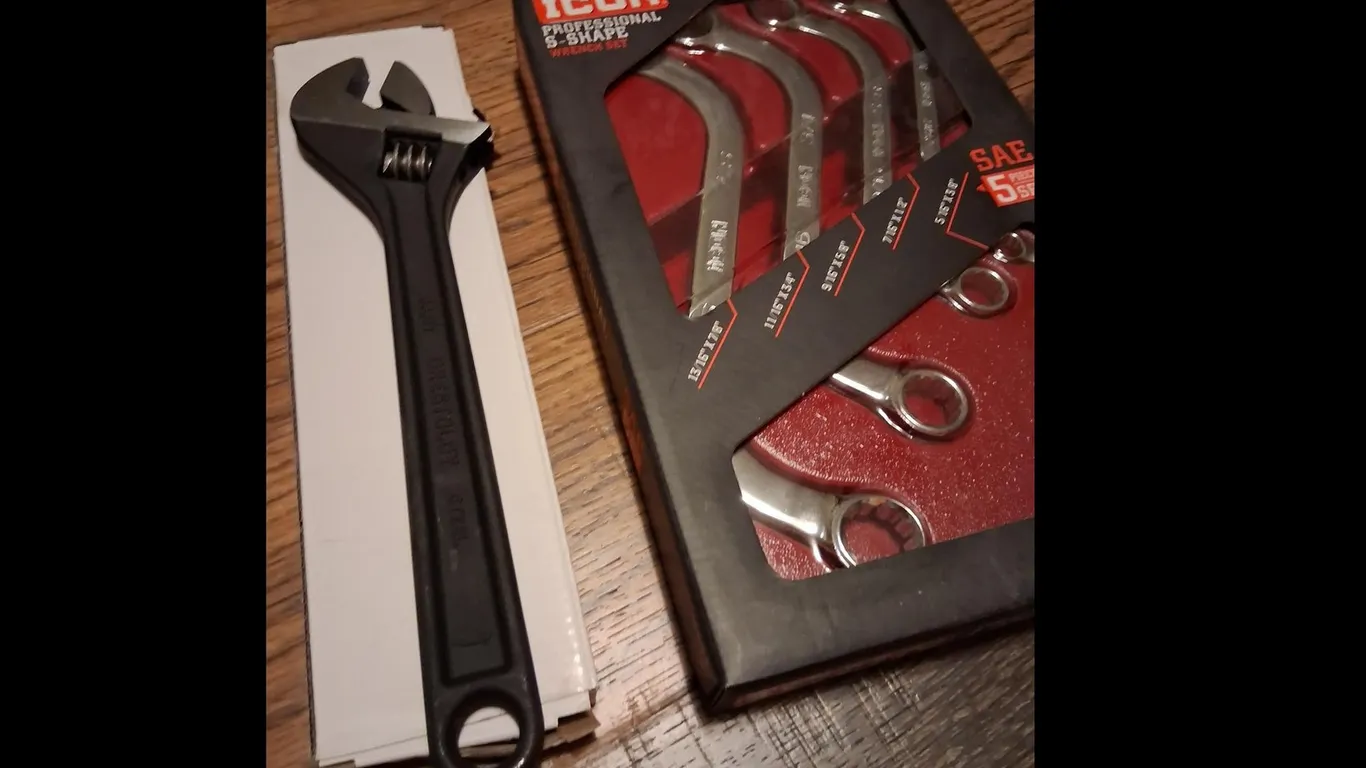 Wrenches. 12” crescent wrench, 4 pc S wrench set, 5/16-7/8